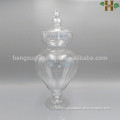 Clear tall glass jar with lid